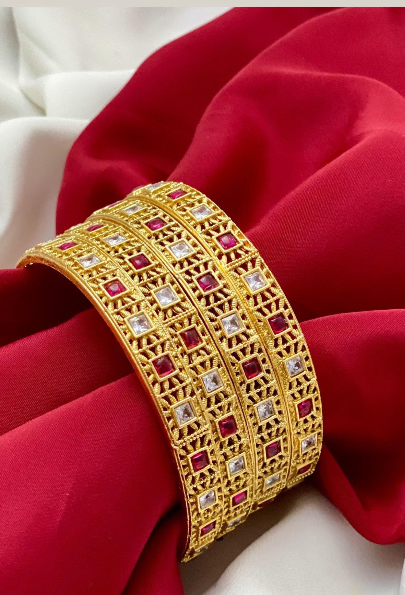 Gold Plated Bangle Set In Ruby Red